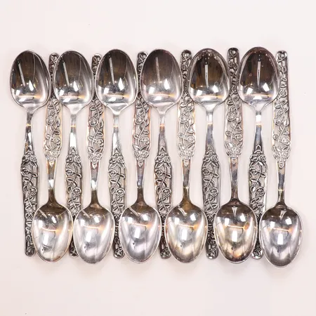 12 Kaffeskedar, längd 12cm, bredd 4-24mm, GAB (Guldsmedsaktiebolaget I Stockholm), modell Rosenranka, 830/1000 silver Vikt: 139,5 g