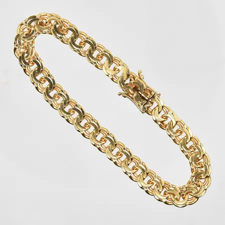Armband Bismarck längd 18½cm, bredd 7mm, 18K. Vikt: 20,4 g