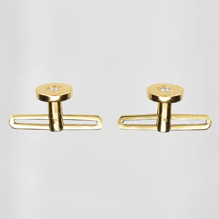 Frackknappar med diamanter 2x0,02ct Ø8mm, 18K. Vikt: 2,4 g