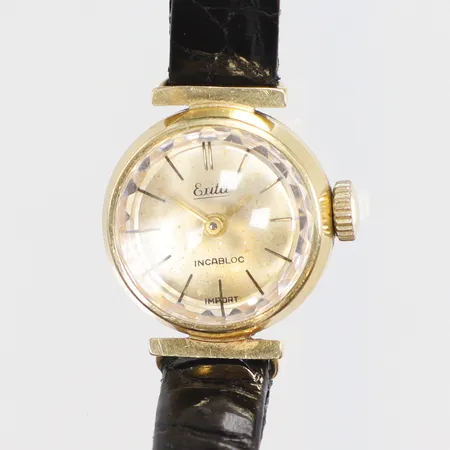 Damur Erita, Ø17mm, manuell, läderband 18K i boett, bruttovikt 10,9g