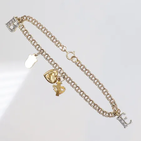 Armband Bismarck 18cm med fyra berlocker, små defekter 18K Vikt: 7 g
