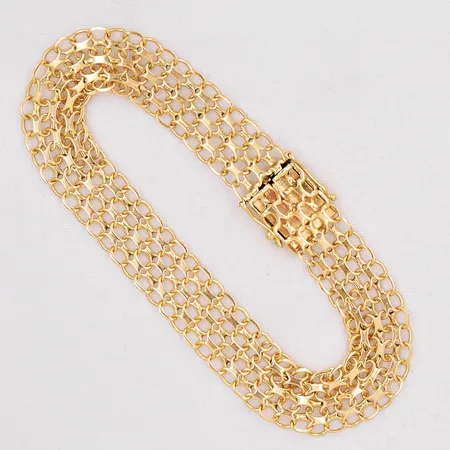 Armband X-länk längd 19cm bredd 10,6mm trögt lås 18K Vikt: 10,8 g
