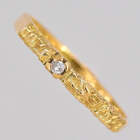 Ring diamant ca 0,01ct stl:16¼ bredd 2,3mm 18K Vikt: 1,4 g