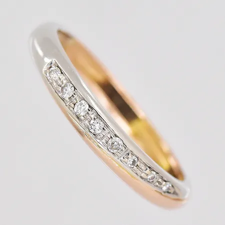 Ring diamanter ca 5x0,01ct 3x0,005ct stl:18½ tvåfärgad 18K Vikt: 3,2 g