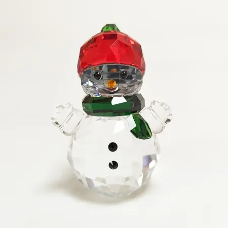 Figurin Swarovski snögubbe med röd mössa, höjd: 5,6cm, originalbox medföljer