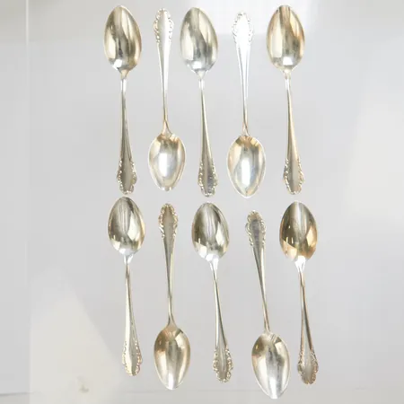 10 Kaffeskedar modell: Haga, längd: 125mm, svenska stämplar, repiga, missfärgade, silver 830/1000 Vikt: 148,6 g