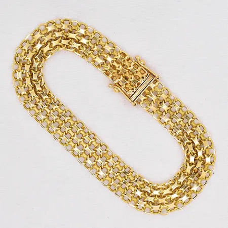 Armband X-länk längd 18,5cm bredd 10,2mm 18K Vikt: 16,4 g