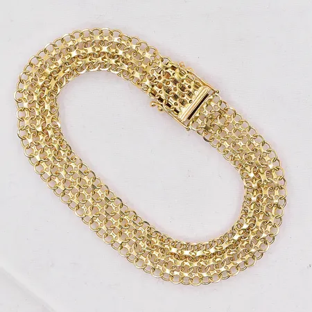 Armband X-länk längd 18,5cm bredd 10,4mm 18K Vikt: 14 g