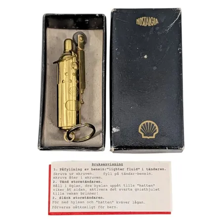 Tändare, mässing, Shell, Nostalgia, 1900-talets senare del, längd inkl. ögla ca. 10 cm, originalbox med tillhörande bruksanvisning, ej funktionstestad