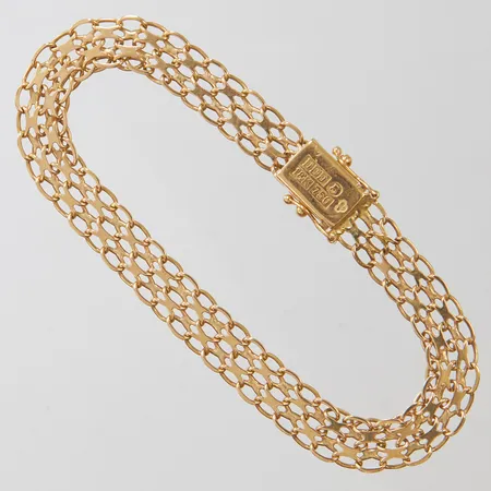 Armband X-länk, längd ca 19,2cm, bredd 8mm, bruksslitage, 18K Vikt: 11,6 g