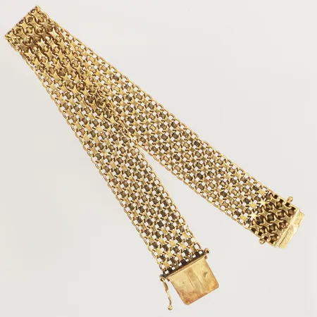 Armband X-länk, längd 19,5cm, bredd 13,5mm, saknar en låsåtta, 18K  Vikt: 22,5 g