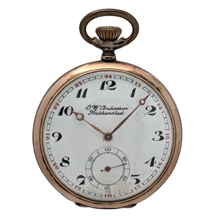 Fickur i silver märkt "O.W. Andersson Kristianstad", Ø50 mm, silver 800/1000, manuell - fungerar, urverk Eve, skyddsboett i stål medföljer,  Vikt: 74,7 g