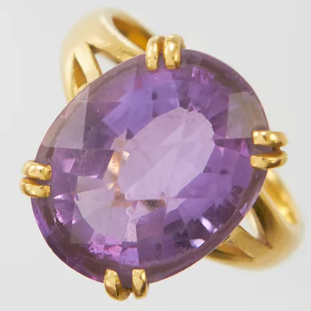 Ring med facetterad ametist, stl17¼, bredd 3-16mm, 23K, bruttovikt: 8,2g.