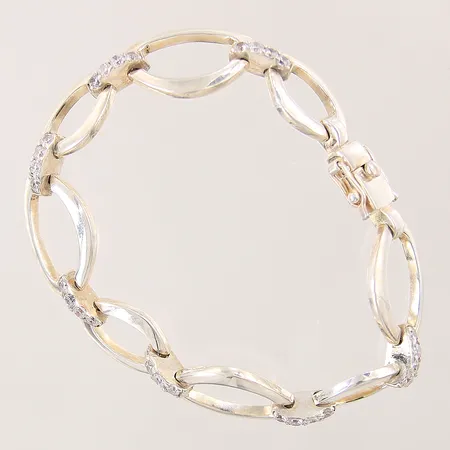Armband med vita stenar, längd 18,5cm, bredd 11,8-14,6mm, GHA, silver 925/1000 Vikt: 26,6 g