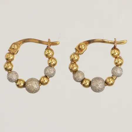 Ett par örhängen, tvåfärgade, Ø13,4mm, 18K Vikt: 1,6 g