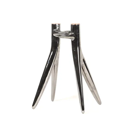 Ljusstake "Abbracciaio", formgiven av Phillippe Starck för Kartell, gjuten aluminium med högblank yta, för två ljus, höjd ca 26cm, bruksslitage.