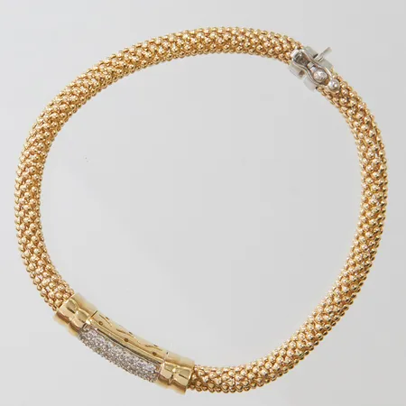 Armband genombruten med vita stenar, längd ca 18,5cm, bredd 7-9,5mm, tvåfärgad, ojämnheter, skev, 14K Vikt: 13,4 g