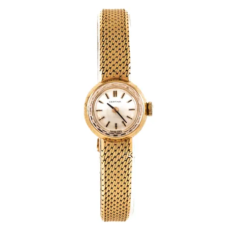 Smyckeur Certina i 18K guld med originalband i 18K. Boett Ø 17 mm, manuell, safirglas, total längd 16,5/17 cm. Brott i urband närmast boett. Bruttovikt: 25,3g. 