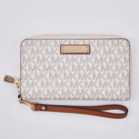 Plånbok Michael Kors längd: ca 17,5cm bredd: ca 10cm handledsrem nyskick