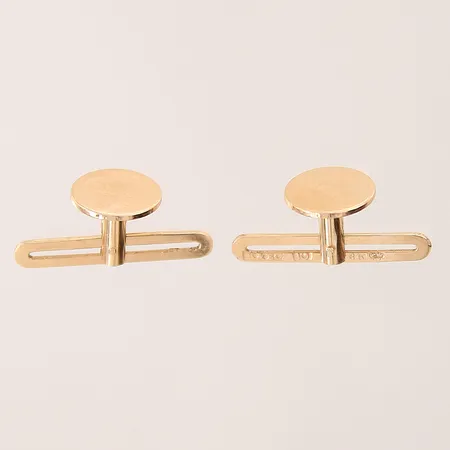 Ett par skjortknappar,  Ø9mm, repiga 18K  Vikt: 2,6 g