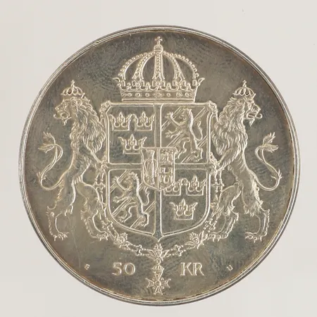Minnesmynt Bröllopet mellan Konung Carl XVI Gustaf och Drottning Silvia, 19 juni 1976, 50kr, Ø36mm, 925/1000 silver  Vikt: 27,1 g