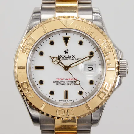 Herrur Rolex Oyster Perpetual Date Yacht-Master, stål/guld, automatisk, Ø 40mm, datum, ref: 16623, serienummer: 860C2195, verknr: 33255804, oysterlänk stål/guld, viklås clasp code LT7, total längd ca 17,5cm, skadad/skrapmärke på sidan av boetten samt ena hornet, certifikat Rob Engström 2011, 1 extra länkbit, box, ytterkartong