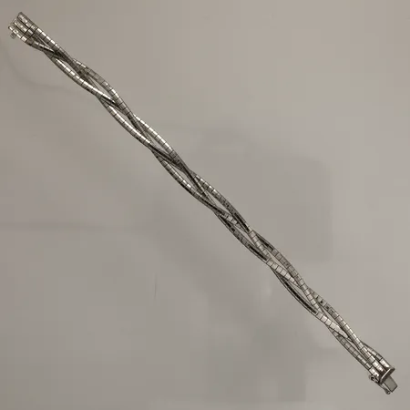 Armband flätat, längd 19cm, bredd 8,5mm, glappt lås, 835/1000 silver Vikt: 16,1 g