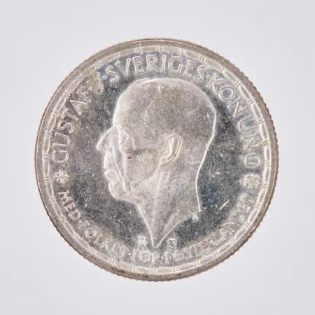 Ett mynt Gustaf V 2kr år 1950 400/1000 silver Bruttovikt  Vikt: 13,9 g