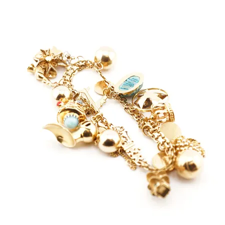 Armband x-länk m 18 berlocker, 21cm, bredd 6mm, 18k Vikt: 64,6 g