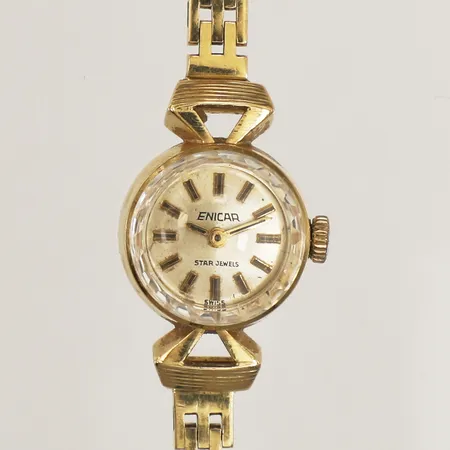 Damur Enicar 18K, manuell, 16mm, integrerad Korridorlänk 18K ca 16,5cm, en säkerhetsåtta saknas, skadad urtavla, bruttovikt 20,8g 