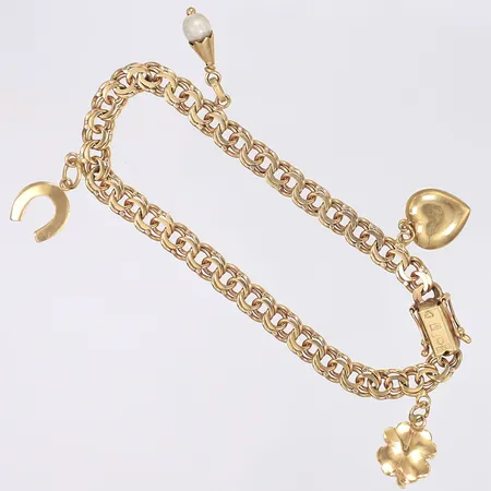 Armband Bismarck med fyra berlocker 19cm bredd 6mm tillv. Bg:S Guld Bernt Gottschalk år 1964 18K Vikt: 15,9 g