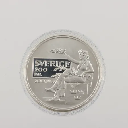 Minnesmynt, Ø36mm, nominellt värde 200kr, Nobelprisets hundraårsjubileum 2001, plastetui, 925/1000 silver Vikt: 27 g Vikt: 27 g