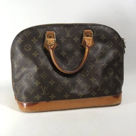 Handväska Louis Vuitton "Alma" Monogram Canvas datumkod: VI0955 mått ca 23x16x30cm detaljer i gulmetall, innerfack, lätt slitage på läder, fläckar utvändigt, inga tillbehör