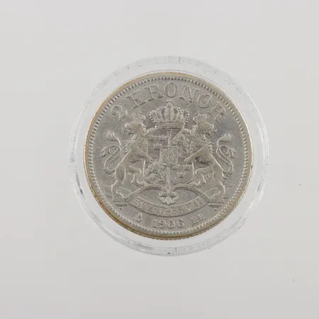 Mynt 2 Kronor - Oscar II, Ø31mm, präglat år 1906, plastetui, certifikat från myntverket, 800/1000 silver, 15,0g.