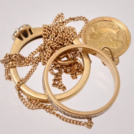 Diverse defekt guld, 18K, vikt 8,5g.