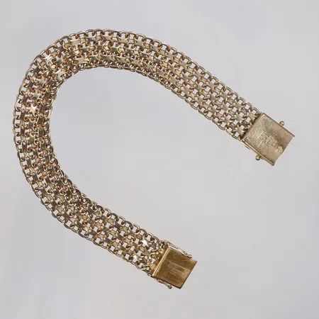 Armband X-länk, längd 18cm, bredd 11mm, ena låsåttan defekt, 18K Vikt: 24,5 g