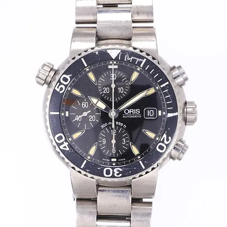 Herrur Oris refnr: 7542 serienr: 23-47198 titan automat Ø42mm datum repig inga tillbehör 