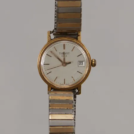 Damur Tissot 18K, 22mm, quartz, går ej/batteribyte krävs, flexband i doublé, gravyr.
