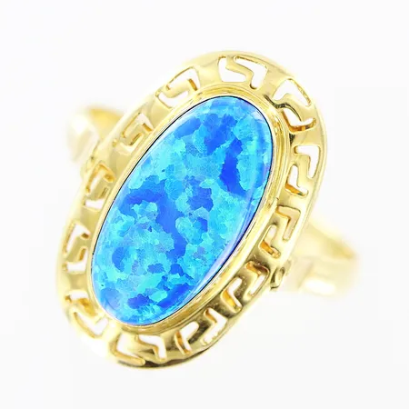 Ring, opalimitation, genombruten meanderbård, stl 18, bredd 2-20mm, 14K.  Vikt: 2,9 g