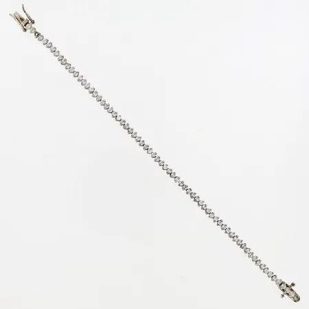 Armband Riviére med vita stenar, 1 sten saknas, 17,5cm, bredd: 3mm, GHA silver 925/1000 Vikt: 9,2 g