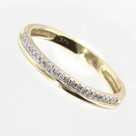 Ring diamanter 23 x ca 0,005ct stl 17, bredd 2mm, 9K.  Vikt: 1,2 g