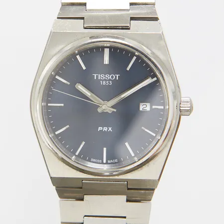 Herrur Tissot PRX, stål, quartz, 40mm, ref T137.410A, safirglas, datum, stållänk, viklås, stötskada, repor på länk samt boett, inga tillbehör. 