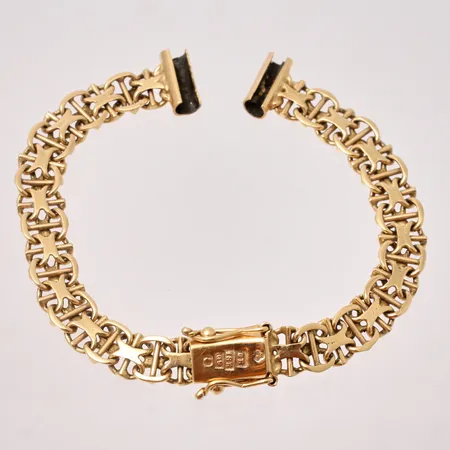 Armband till klocka i 18K guld, 15cm, X-länk med stav, bredd 6,8mm, vikt 12,12g.