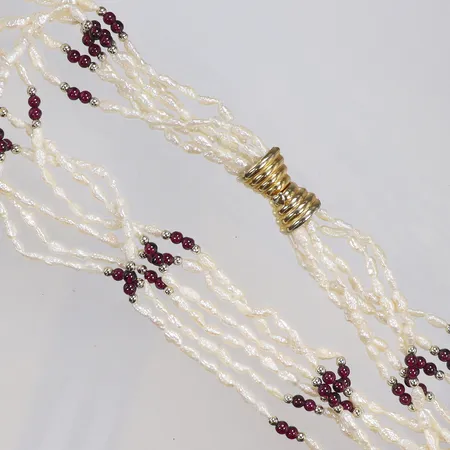 Collier med odlade sötvattenpärlor och lila stenar/plast längd 61cm 