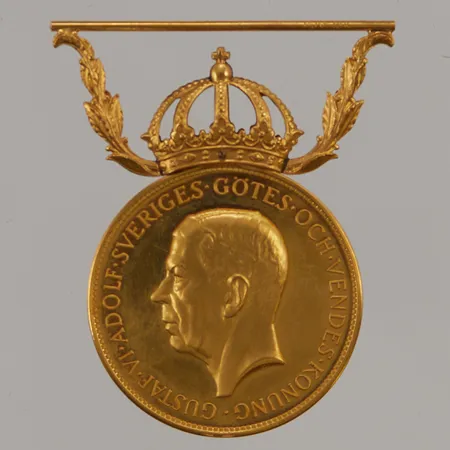 Medalj, 41mm, graverad, 18K 13,6g.