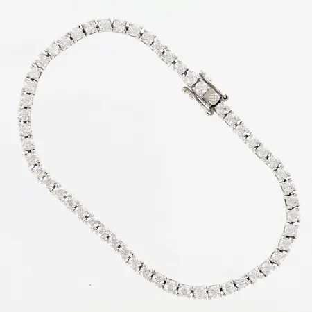 Armband med vita stenar, ca 19,5cm, bredd ca 3mm, mindre skevheter, 925/1000 silver Vikt: 11,1 g