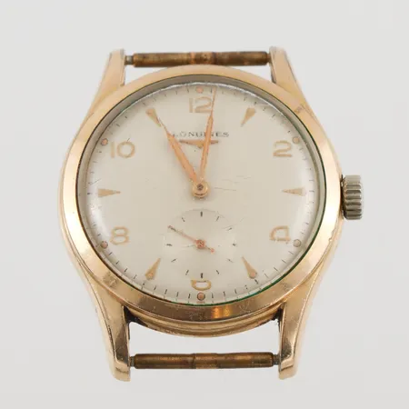 Herrur Longines, 36mm, guld på stål, liten sekundvisare, utbytt krona, går ej, repigt plexiglas, inga tillbehör.