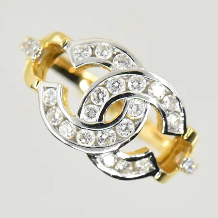 Ring med diamanter 0,46ctv, stl 15¾, bredd 2-10 mm, obs ej märkesdesign, gulguld/vitguld, ostämplad, 18K. Vikt: 3,5 g