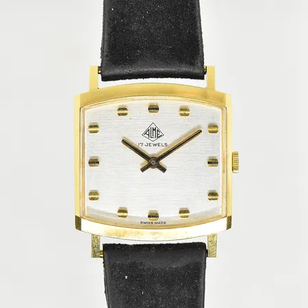 Herrur Alme 18K, boett 29x29 mm, manuell, läderband, boettnr 43823, cal 1525, fungerade vid testtillfället, inga tillbehör, bruttovikt 27,9g