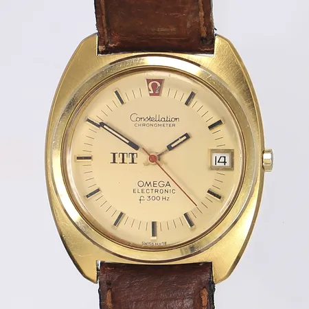 Omega Constellation Chronometer quartz datum Ø38mm gulmetall defekt läderband 